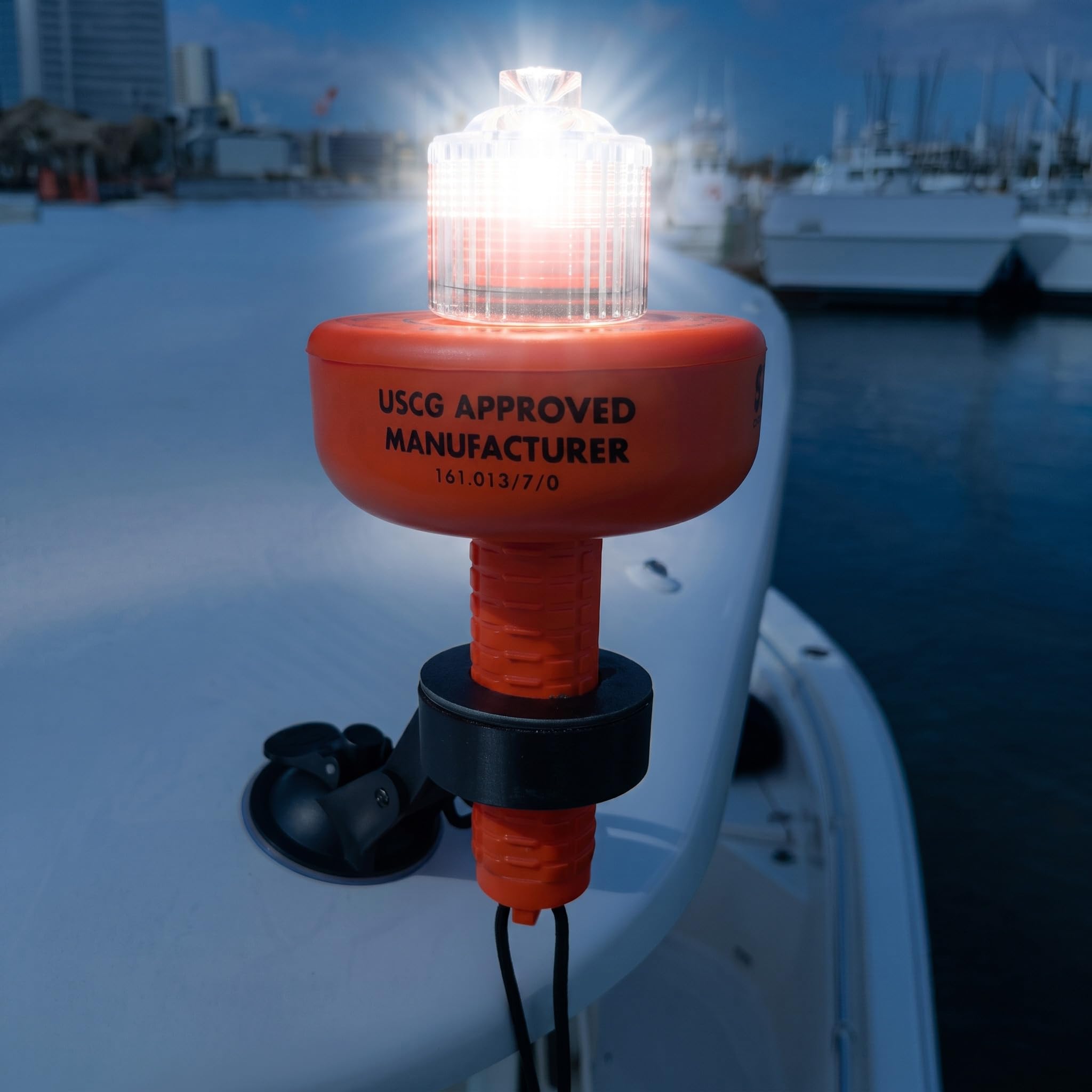 SIRIUS SIGNAL lit at night on dark water illustrating 10 nautical mile visibility