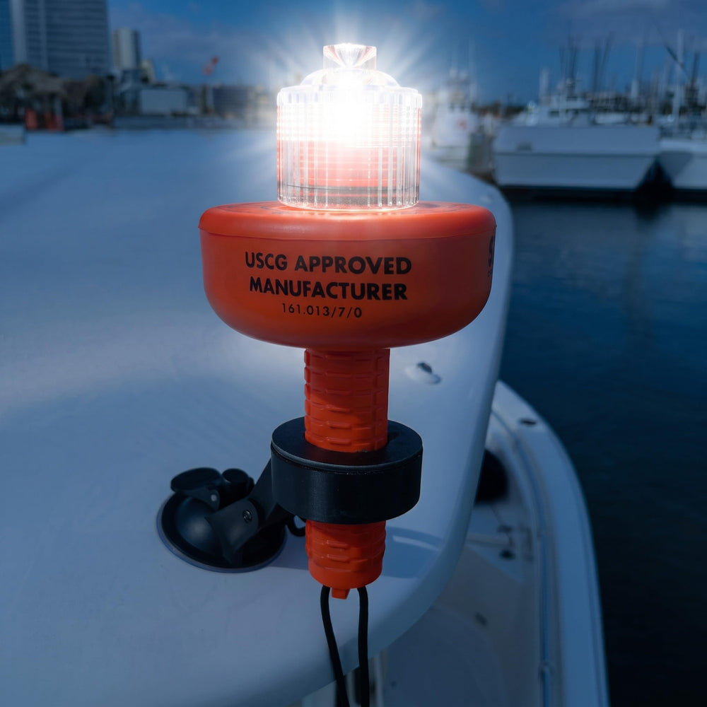 SIRIUS SIGNAL lit at night on dark water illustrating 10 nautical mile visibility