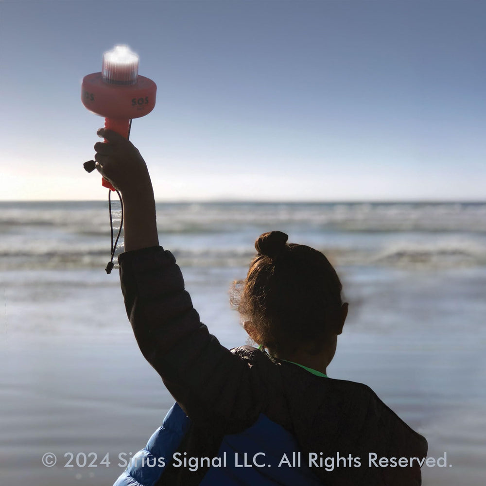 SIRIUS SIGNAL shown in a hand for size comparison and easy portability