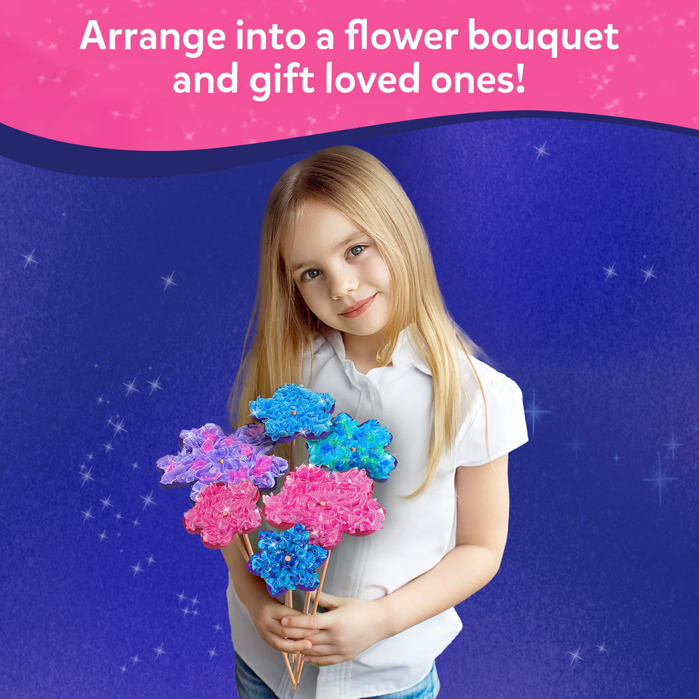Skillmatics child using poke-in stick to create flower illustrating fine motor skill practice
