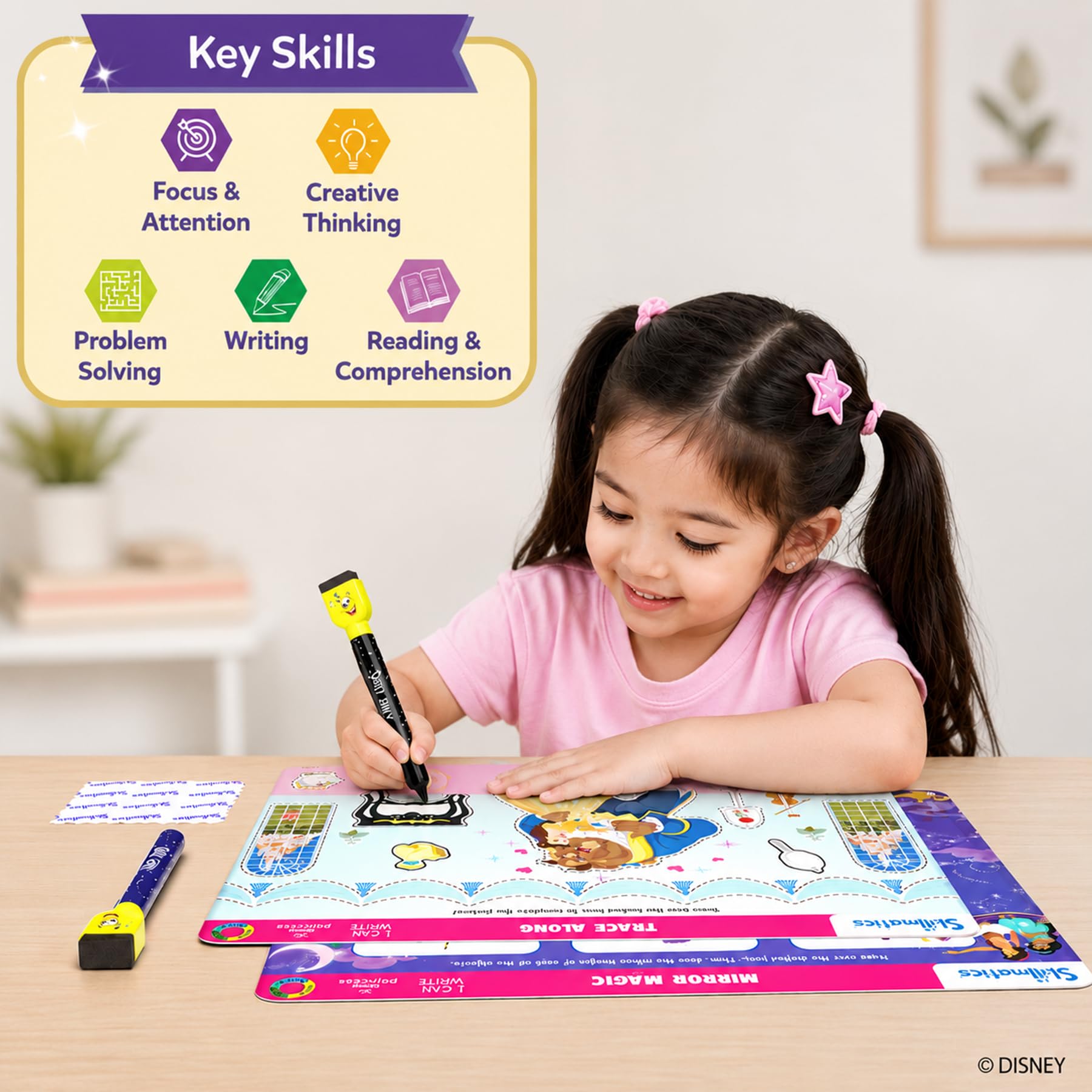 Hand holding a Skillmatics mat to show size and portability for travel and storage