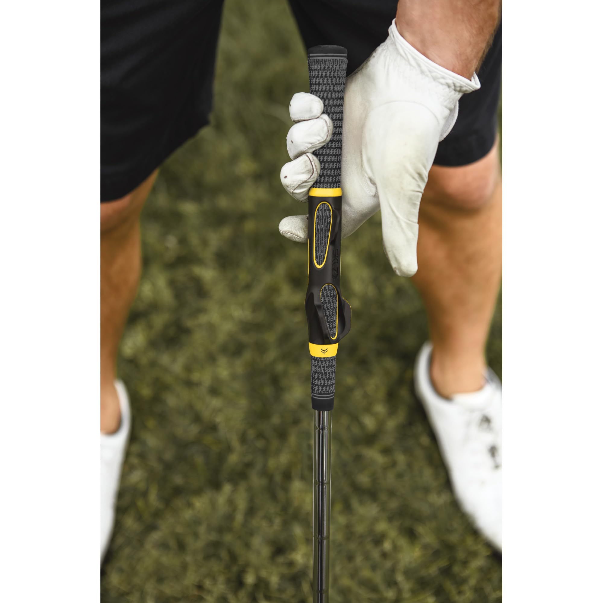 SKLZ used by golfer at driving range, provides instant feedback during warm-up