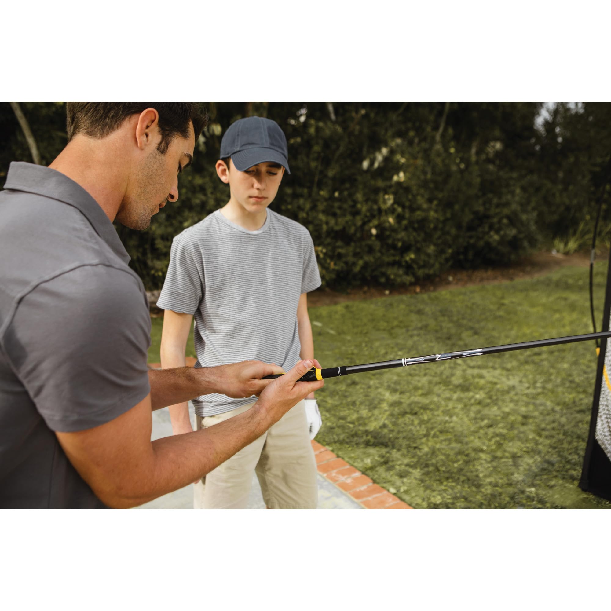 SKLZ beside golf ball and glove for scale, compact and easy to carry