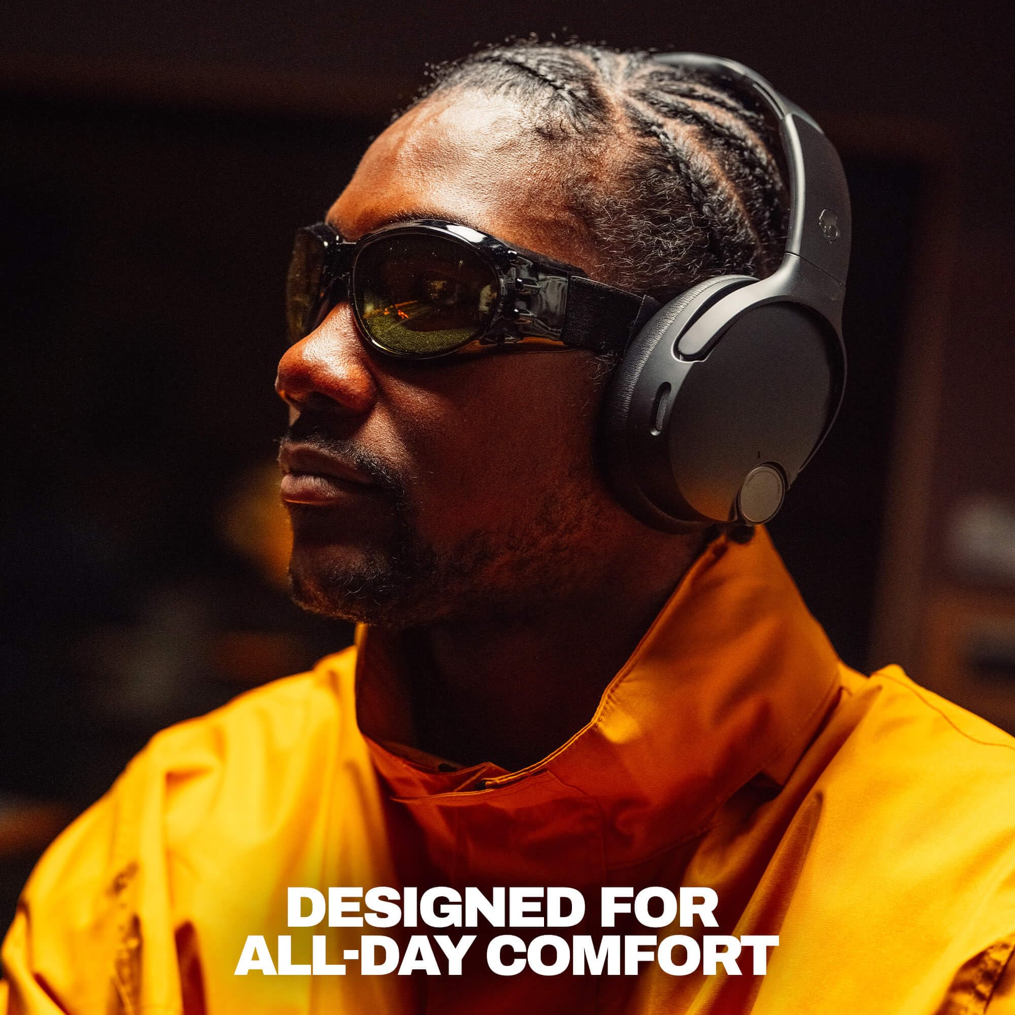 Skullcandy Crusher 1080 worn during commute illustrating Wear Detect convenience and safety