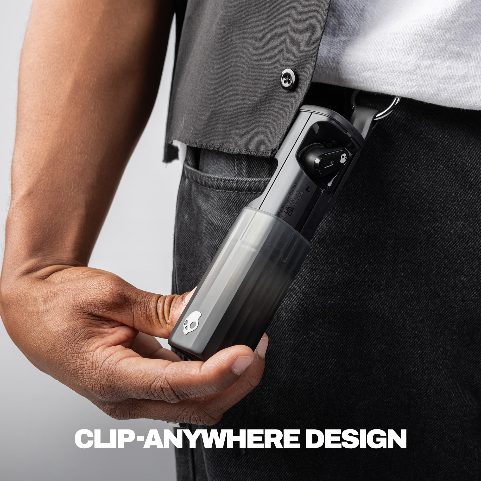 Skullcandy earbud worn in ear demonstrating secure fit while active