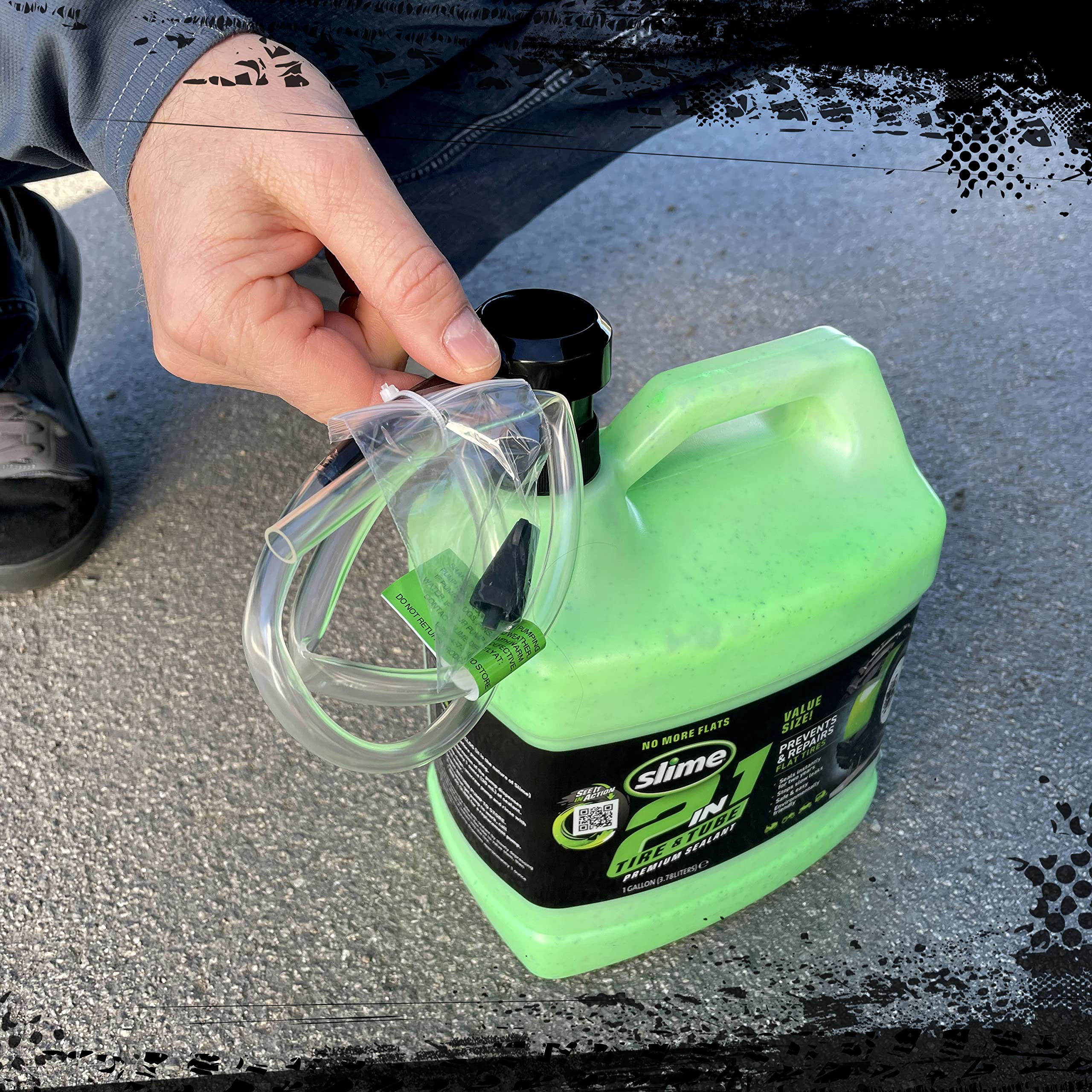 Slime sealant being poured into an off-highway tire to prevent flats