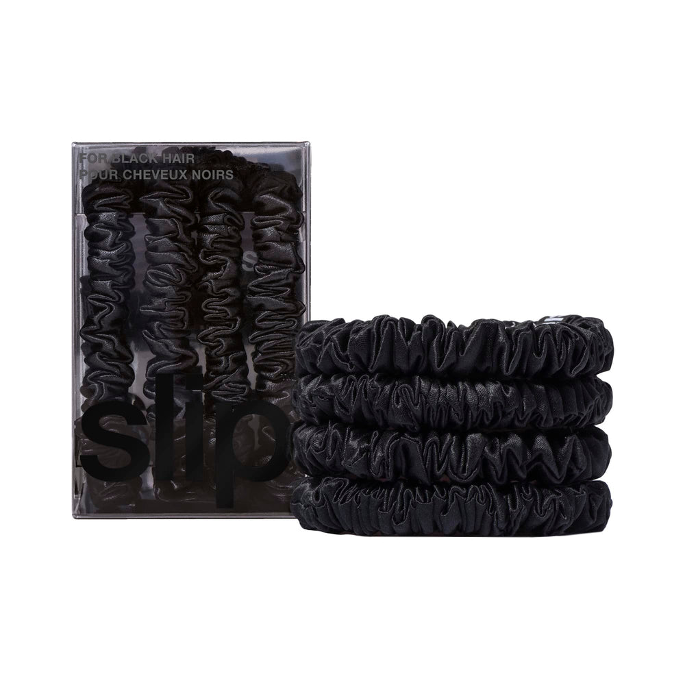 SLIP front packaging showing four black skinny silk scrunchies, refined presentation benefit