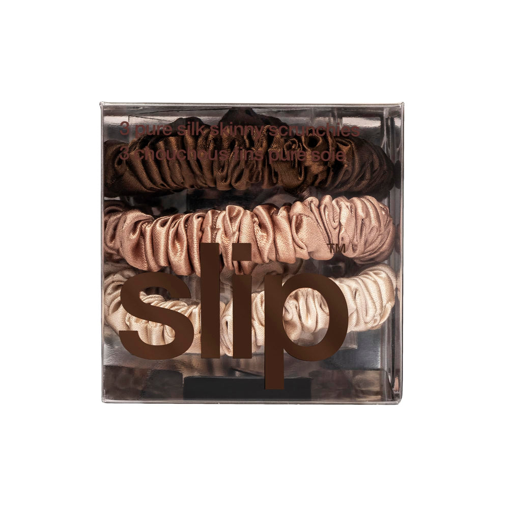SLIP trio of silk scrunchies on white background highlighting discreet, natural tones