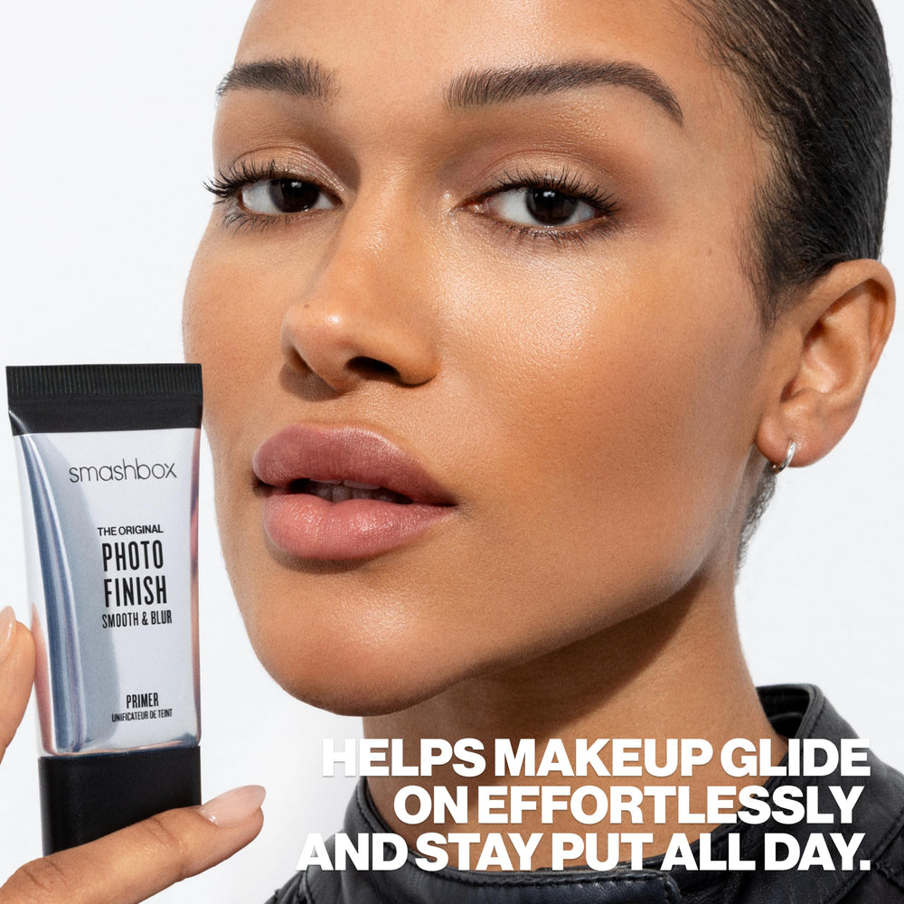 Smashbox primer inside a makeup bag emphasizing portability on-the-go
