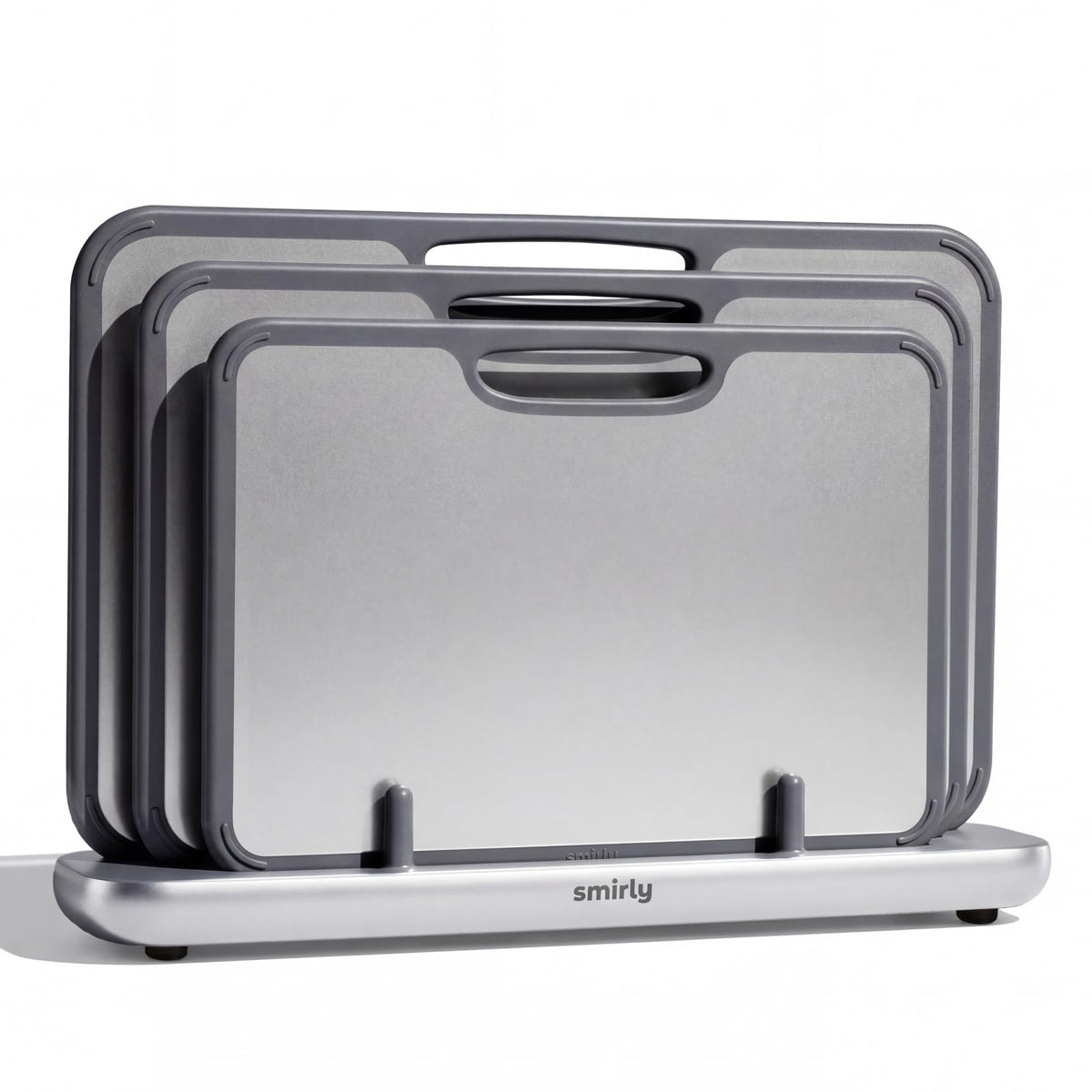SMIRLY cutting board front packaging showing three-board set and holder for organized storage