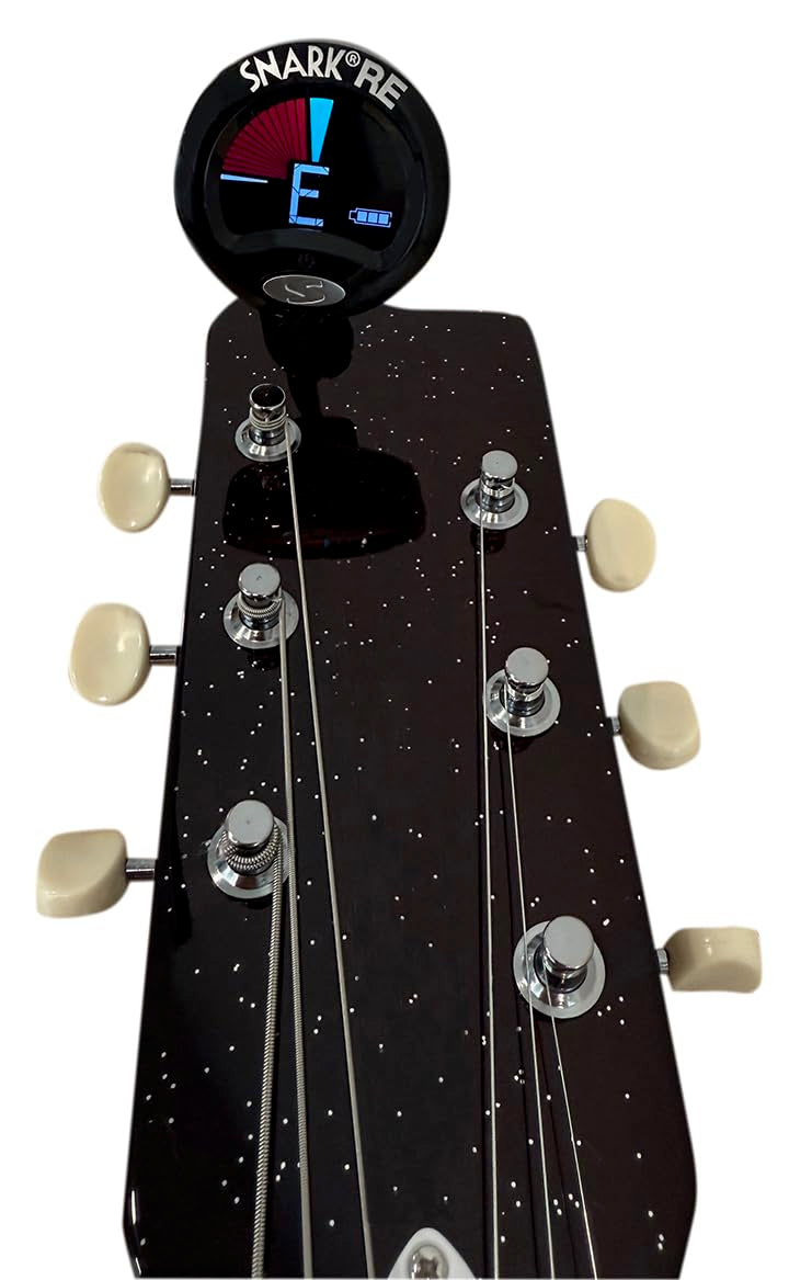 snark SN5X clipped to instrument on stage showing visibility and noisy-venue reliability