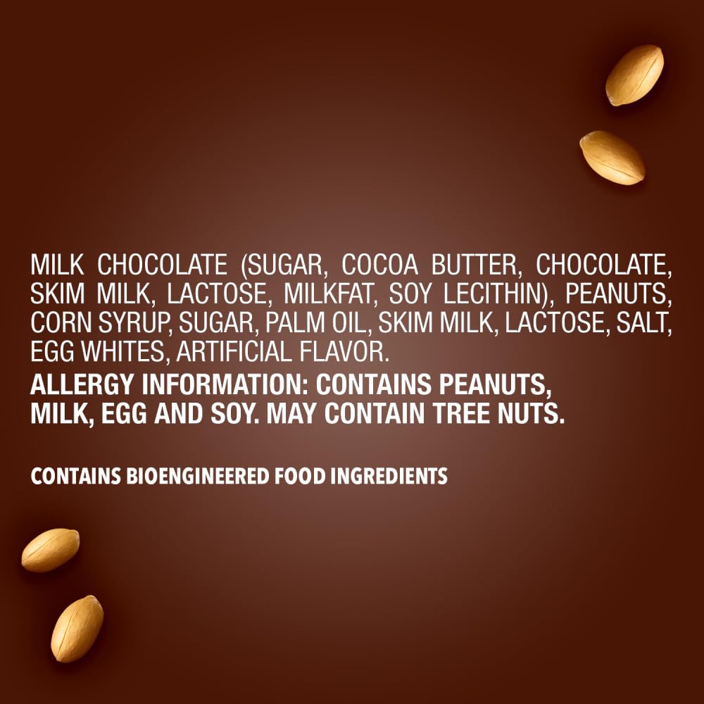 Snickers bar cross-section revealing nougat caramel peanuts for texture insight