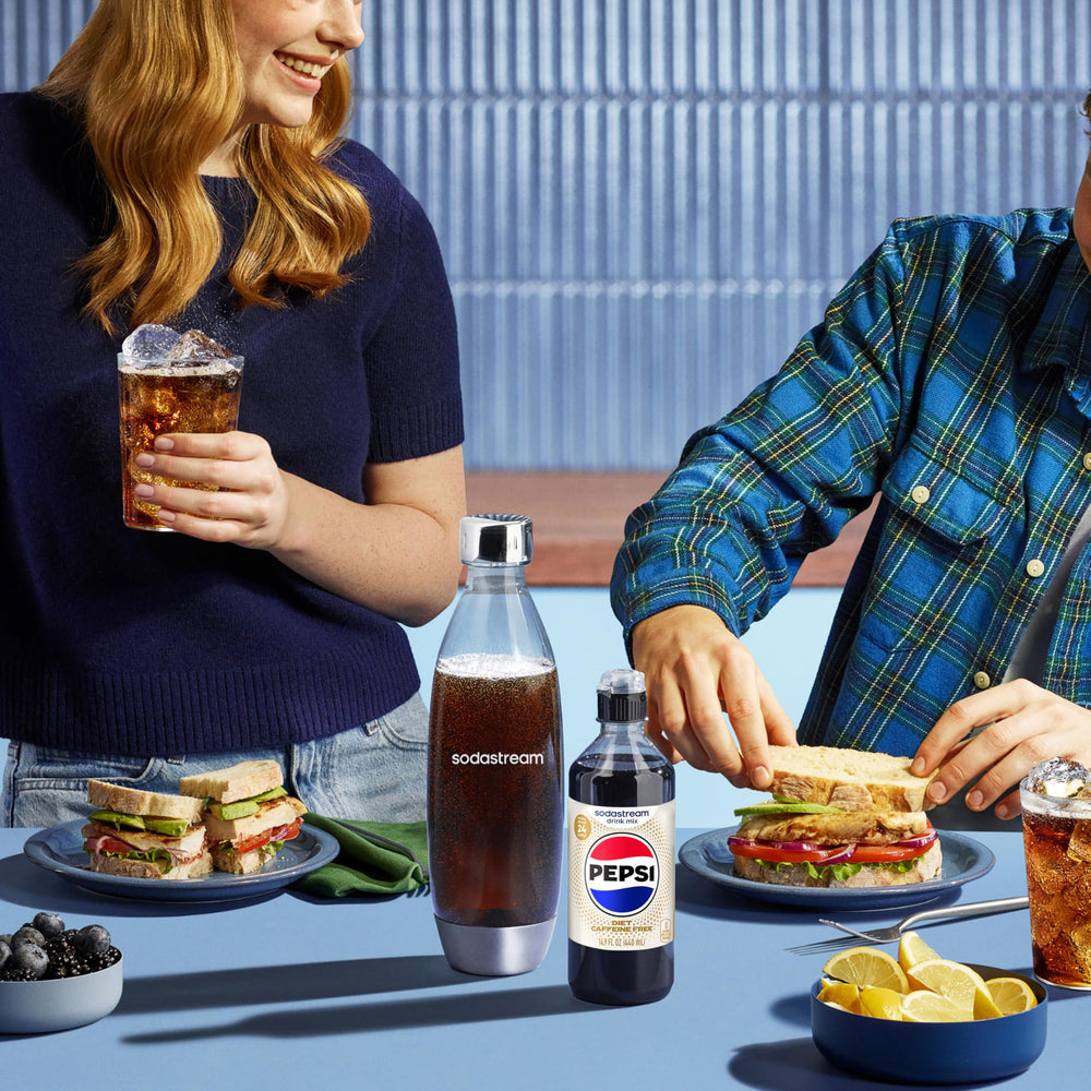 sodastream bottle on kitchen counter in lifestyle scene ready for guests