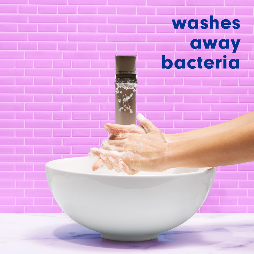 Softsoap bottle on bathroom sink conveying decorative look and everyday accessibility