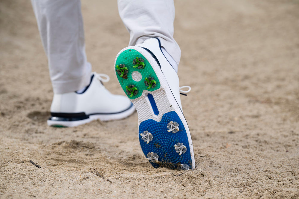 SOFTSPIKES footprint on grass showing green-friendly dispersed contact
