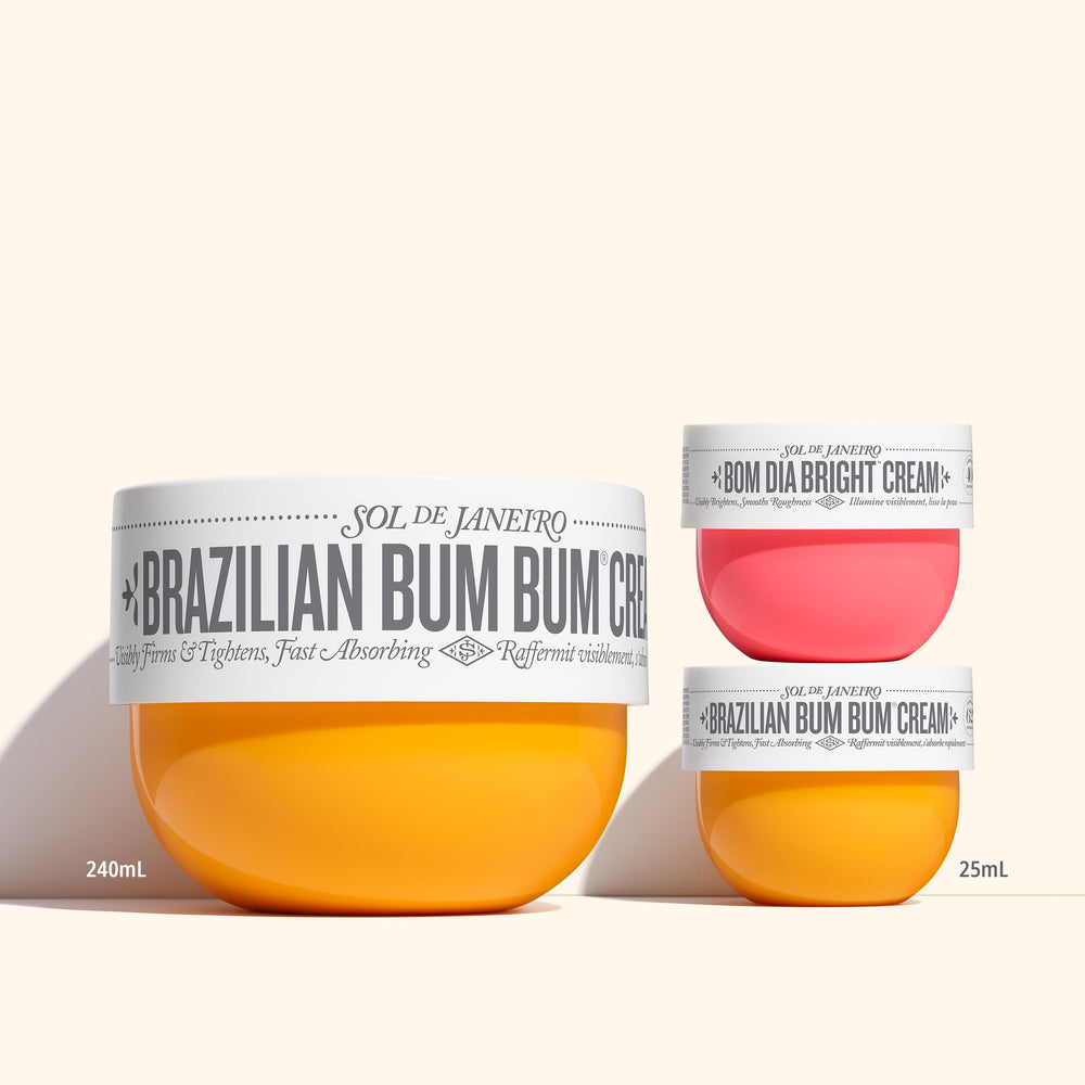 Sol de Janeiro mini duo held in hand to show scale and compact portability benefit