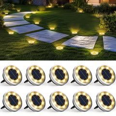 SOLPEX front view of ten solar ground lights showing warm white glow and benefit of instant pathway lighting