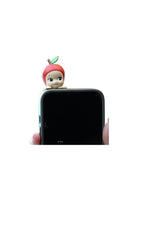 Sonny Angel view of adhesive back demonstrating easy attachment and reuse