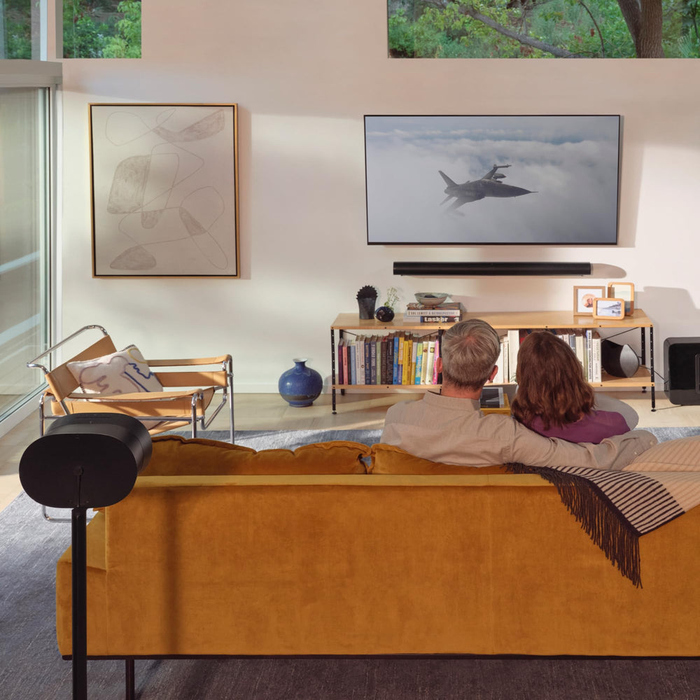 Sonos Era 300 on shelf showing compact size and elegant black design