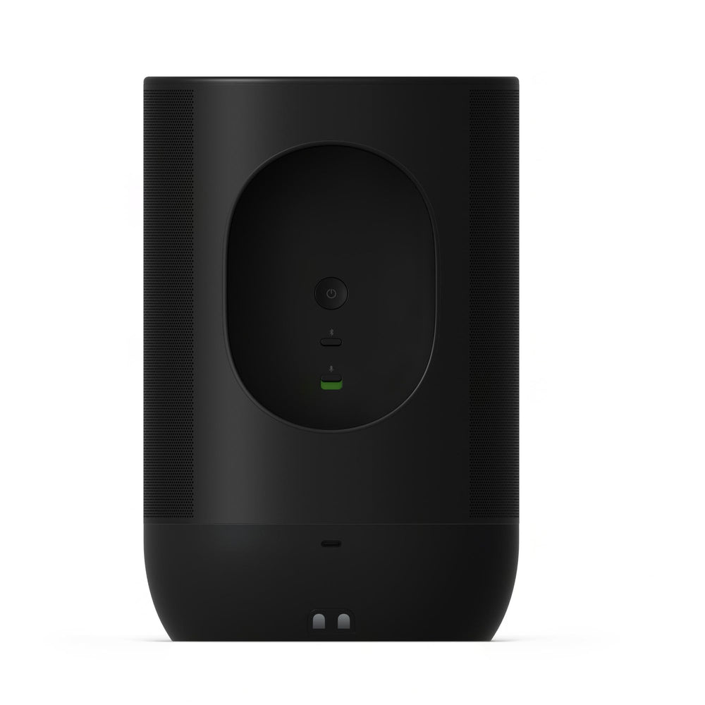 Sonos Move 2 sitting on its wireless charging base for convenient overnight charging