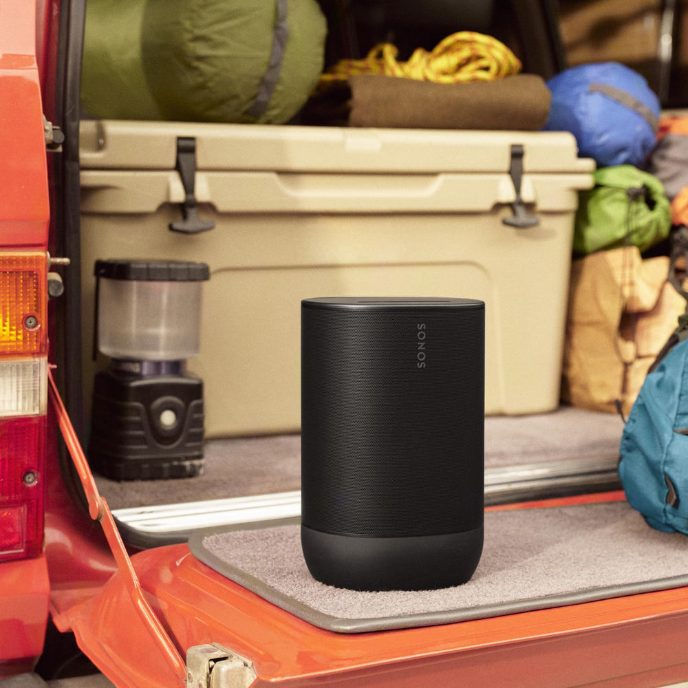 Sonos Move 2 at a patio gathering demonstrating robust outdoor sound and social use