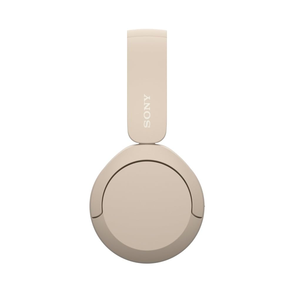 Sony WH-CH520 size comparison in hand showing lightweight, travel-ready build
