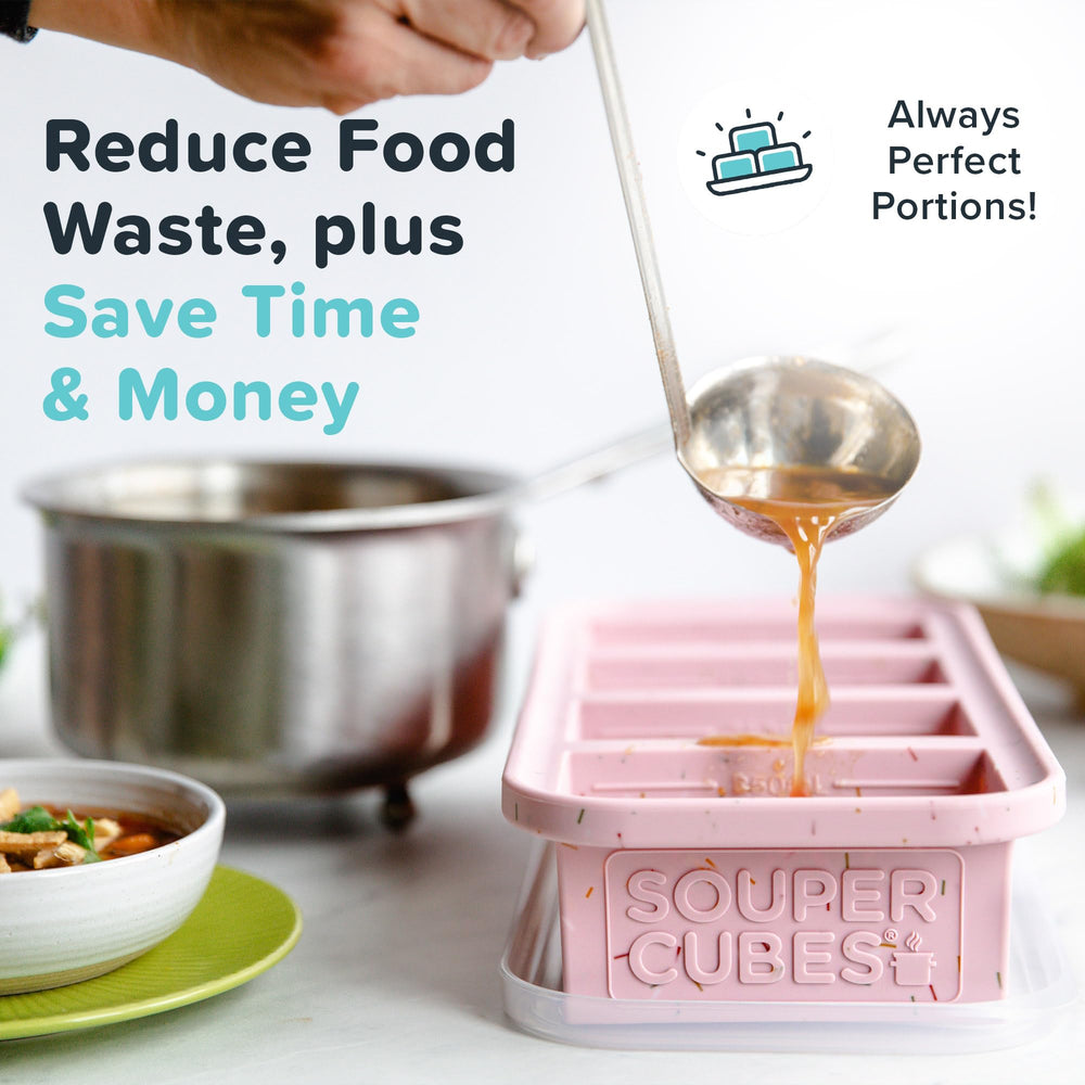 Souper Cubes lids snapped on stacked trays in freezer for organized space-saving storage