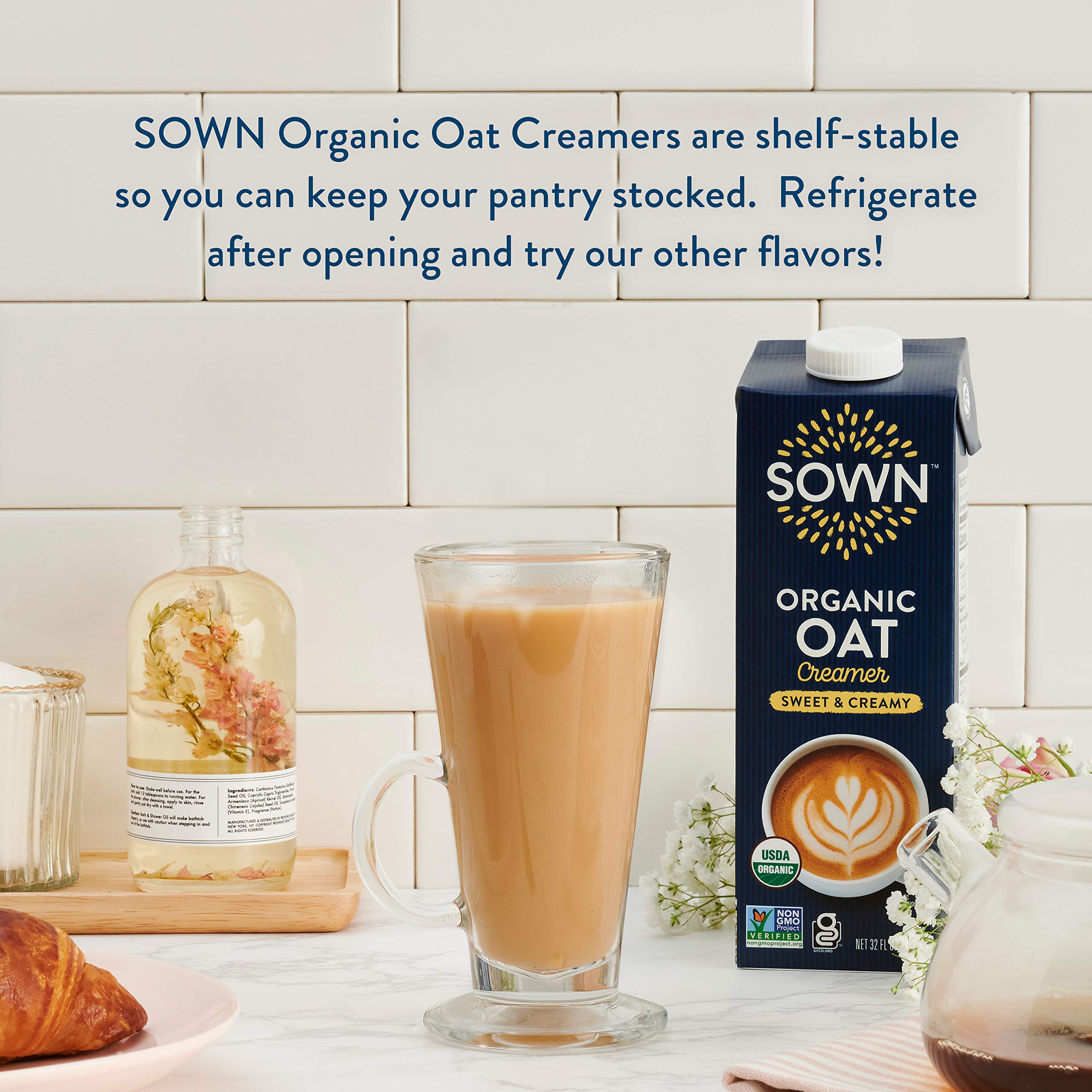 SOWN 32oz carton next to mug for scale, shows serving size and portability