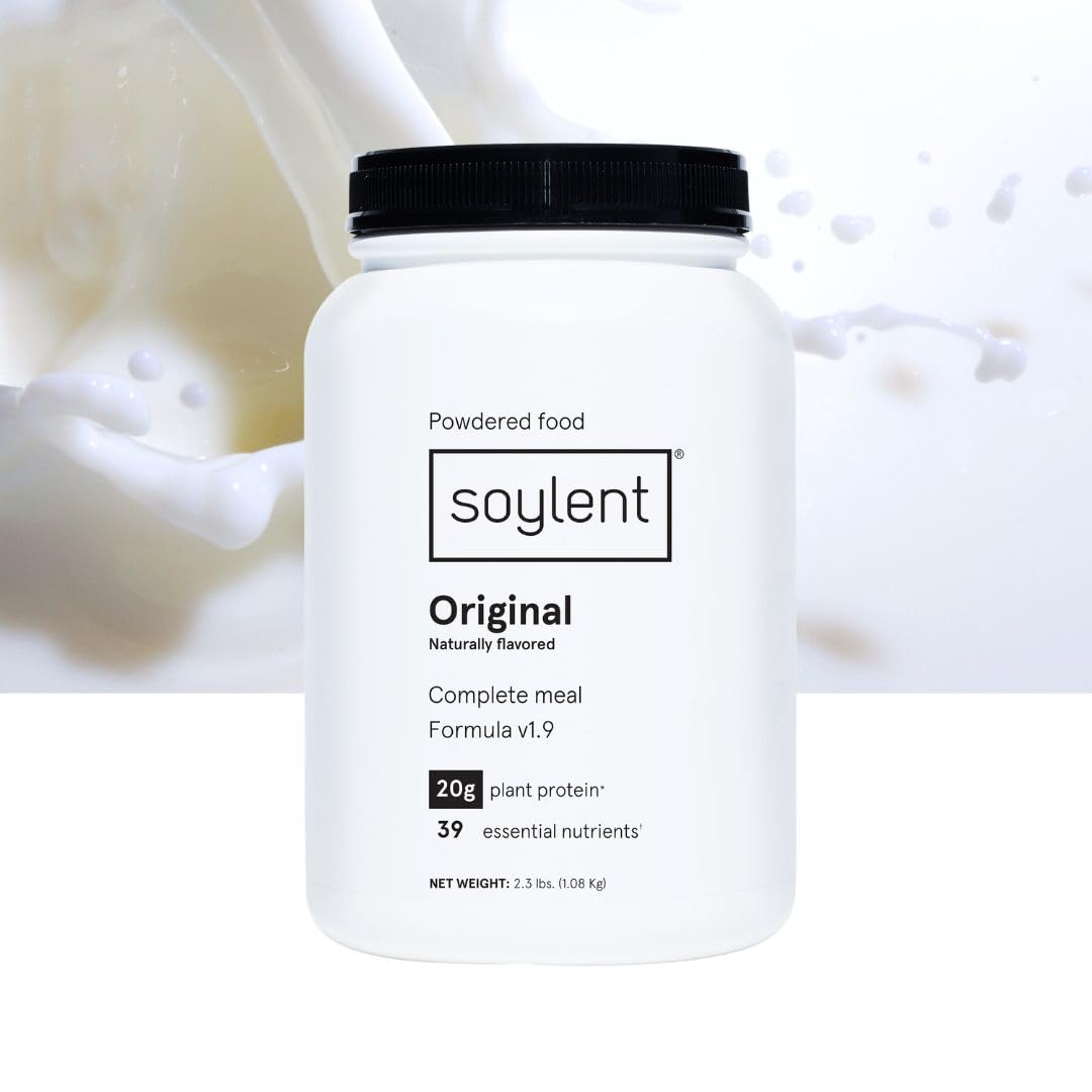 Soylent at a desk breakfast setup, showing quick nutritious meal option