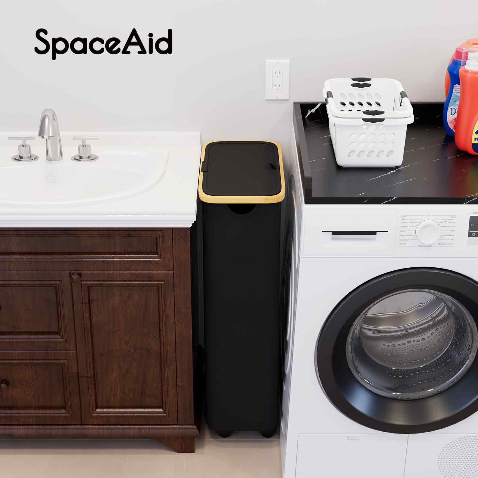 SpaceAid slim hamper tucked between washer and dryer saving floor space