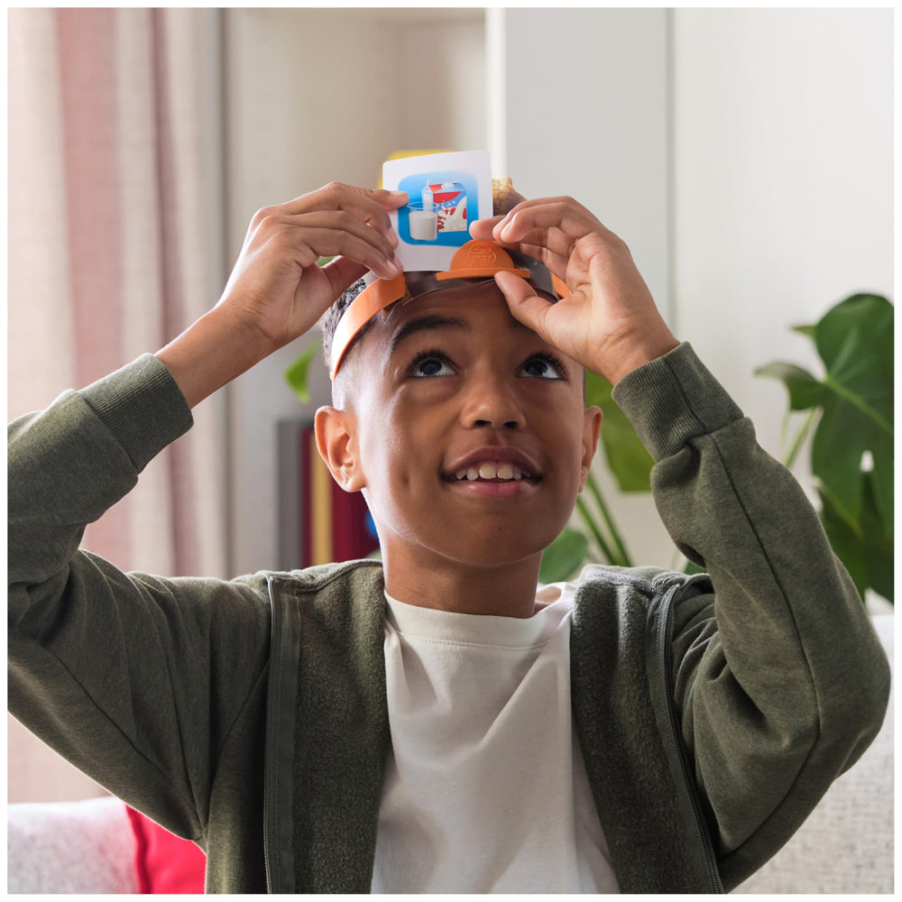 Spin Master Hedbanz family playing in living room promoting inclusive group fun