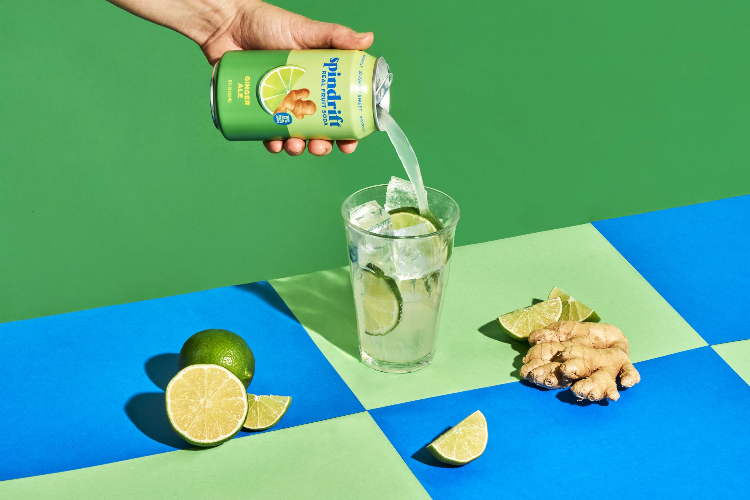 Glass of Spindrift ginger ale with lime garnish for a fresh cocktail mixer