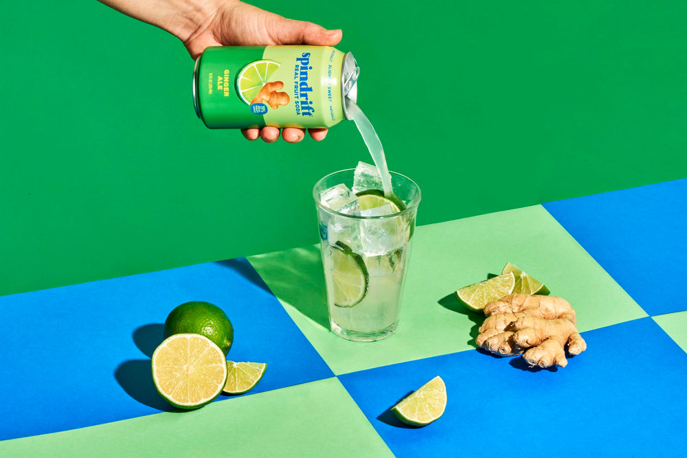 Glass of Spindrift ginger ale with lime garnish for a fresh cocktail mixer