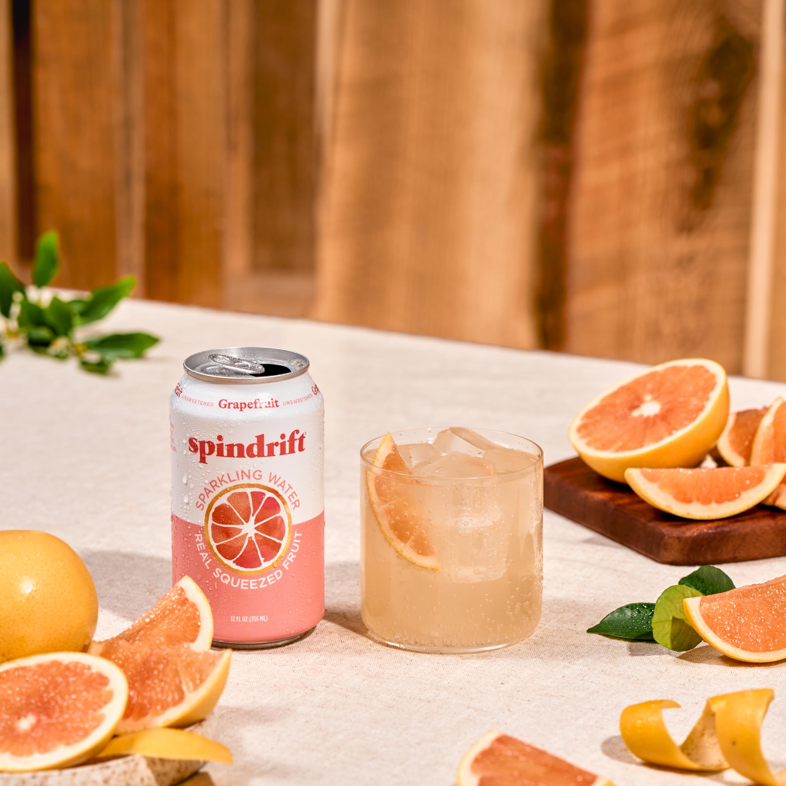Spindrift grapefruit cans in a fridge ready to serve cold refreshments