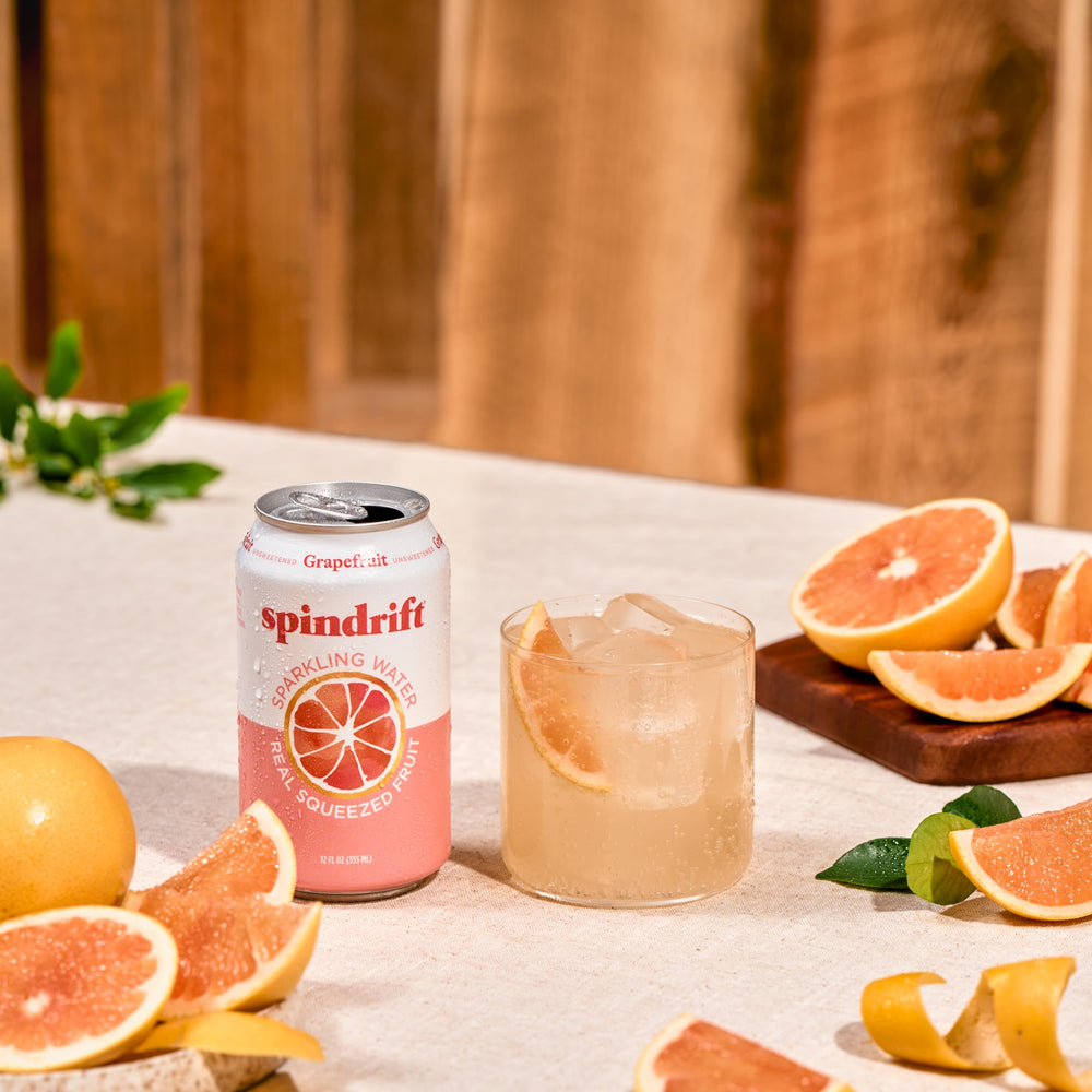 Spindrift grapefruit cans in a fridge ready to serve cold refreshments