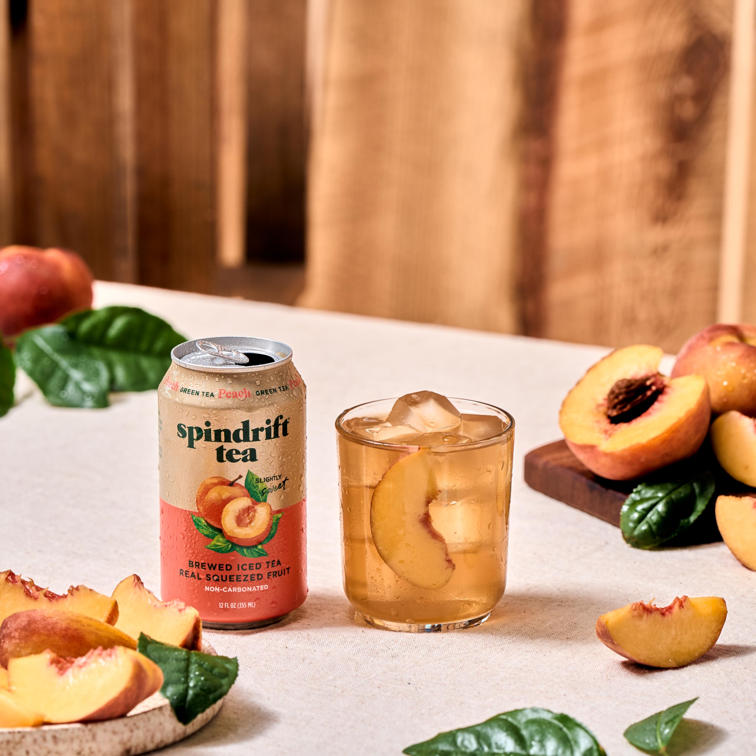 Flatlay of Spindrift ingredients: brewed tea leaves and real peaches