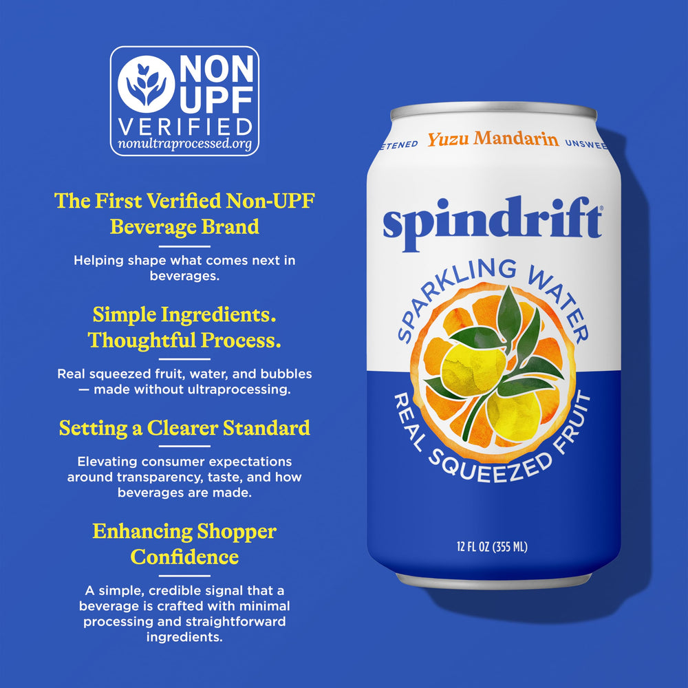 Fresh yuzu and mandarin fruit next to a can highlighting real-squeezed ingredients