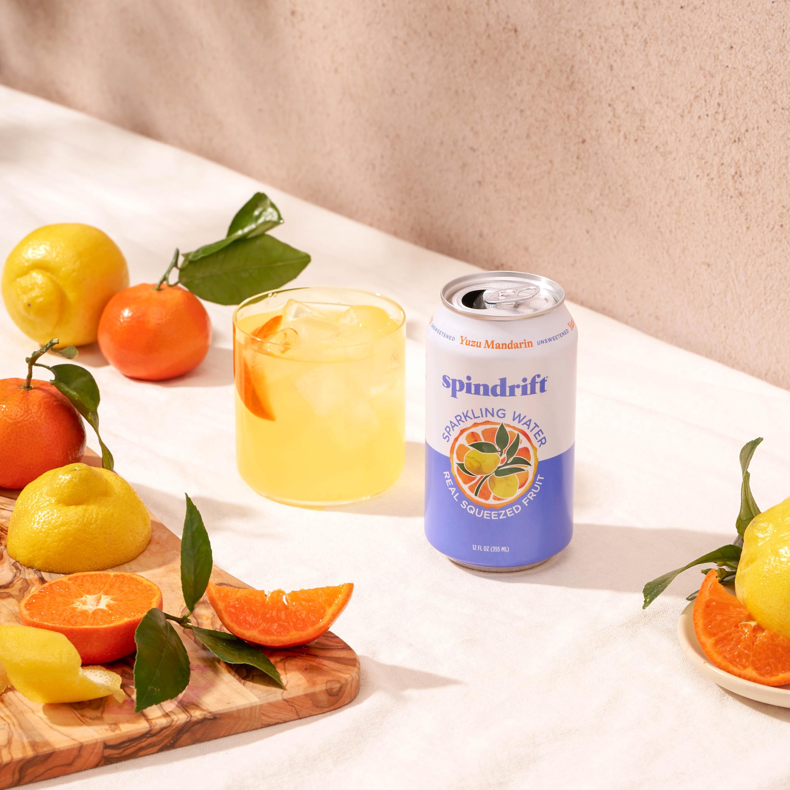 Spindrift can used in a cocktail showing mixability and flavor-enhancing benefit