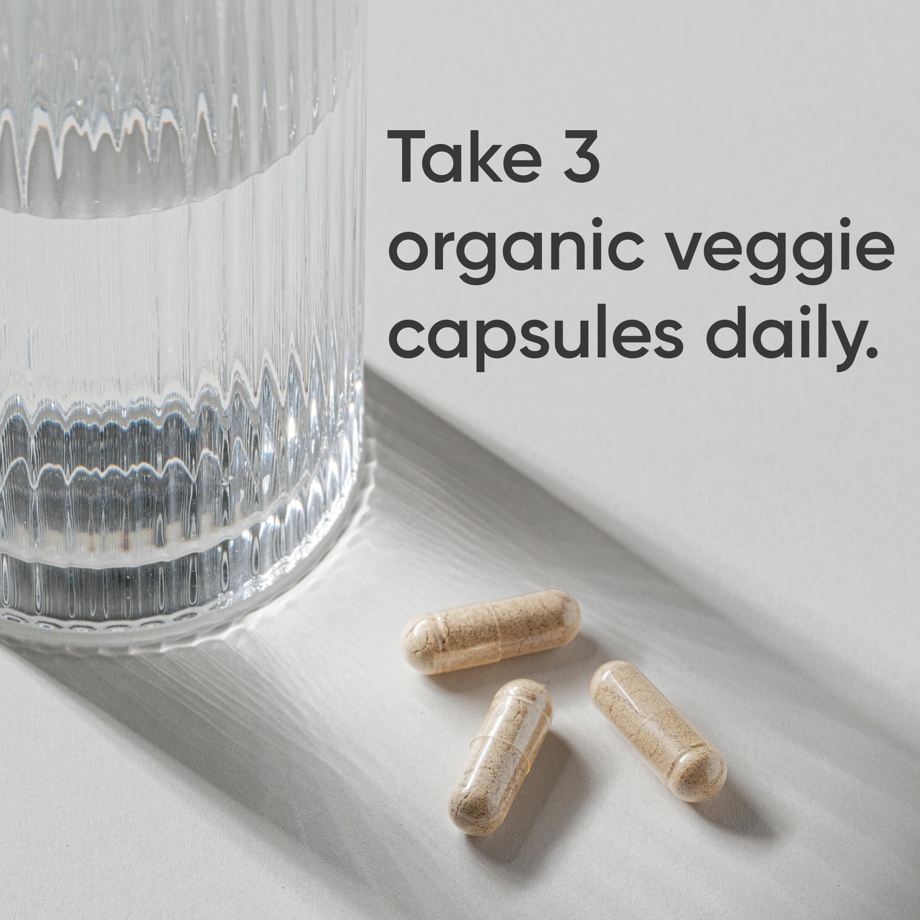 Sports Research close-up of a single capsule highlighting smooth vegan capsule texture and purity