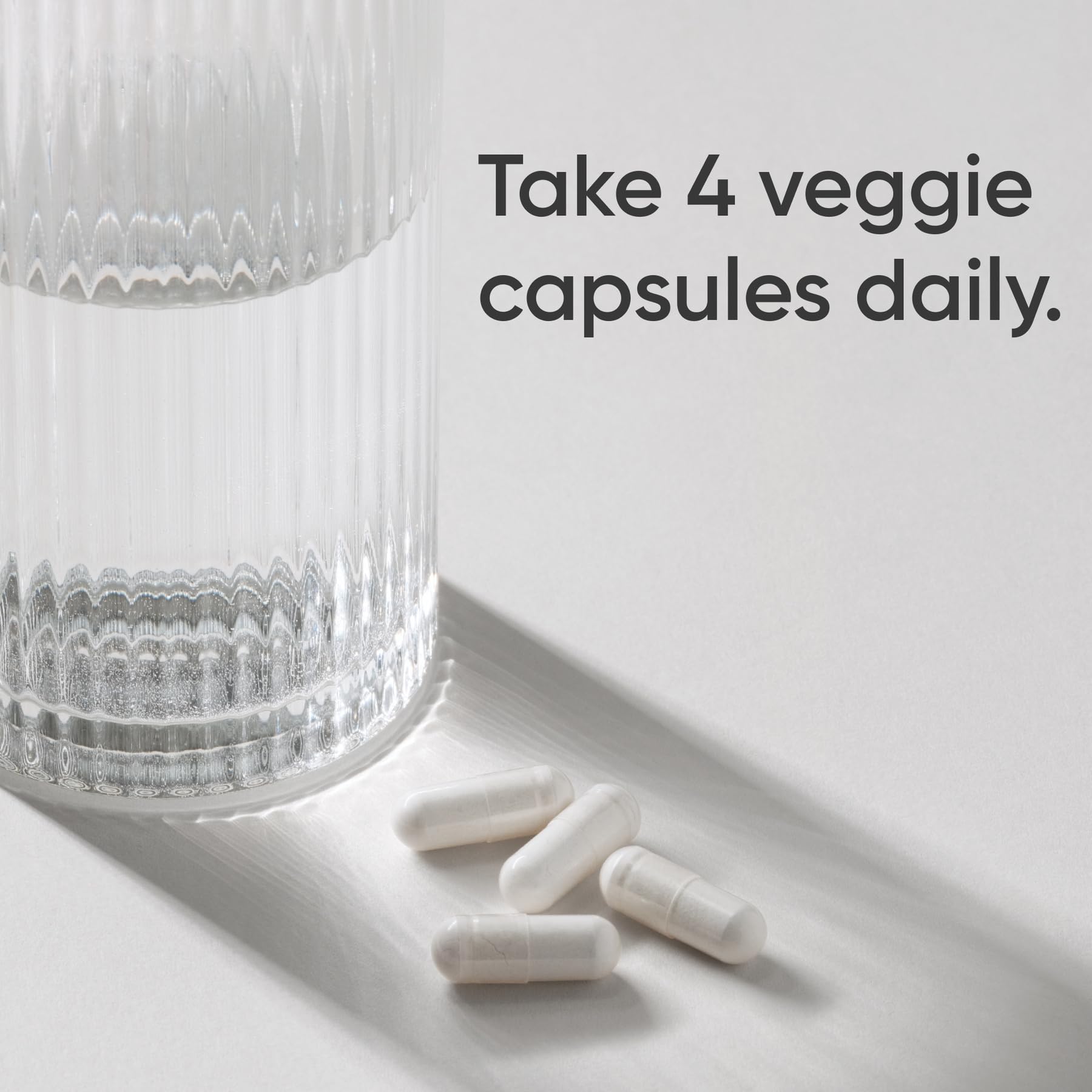 Sports Research open bottle with capsules spilling, showing full 120-count supply advantage