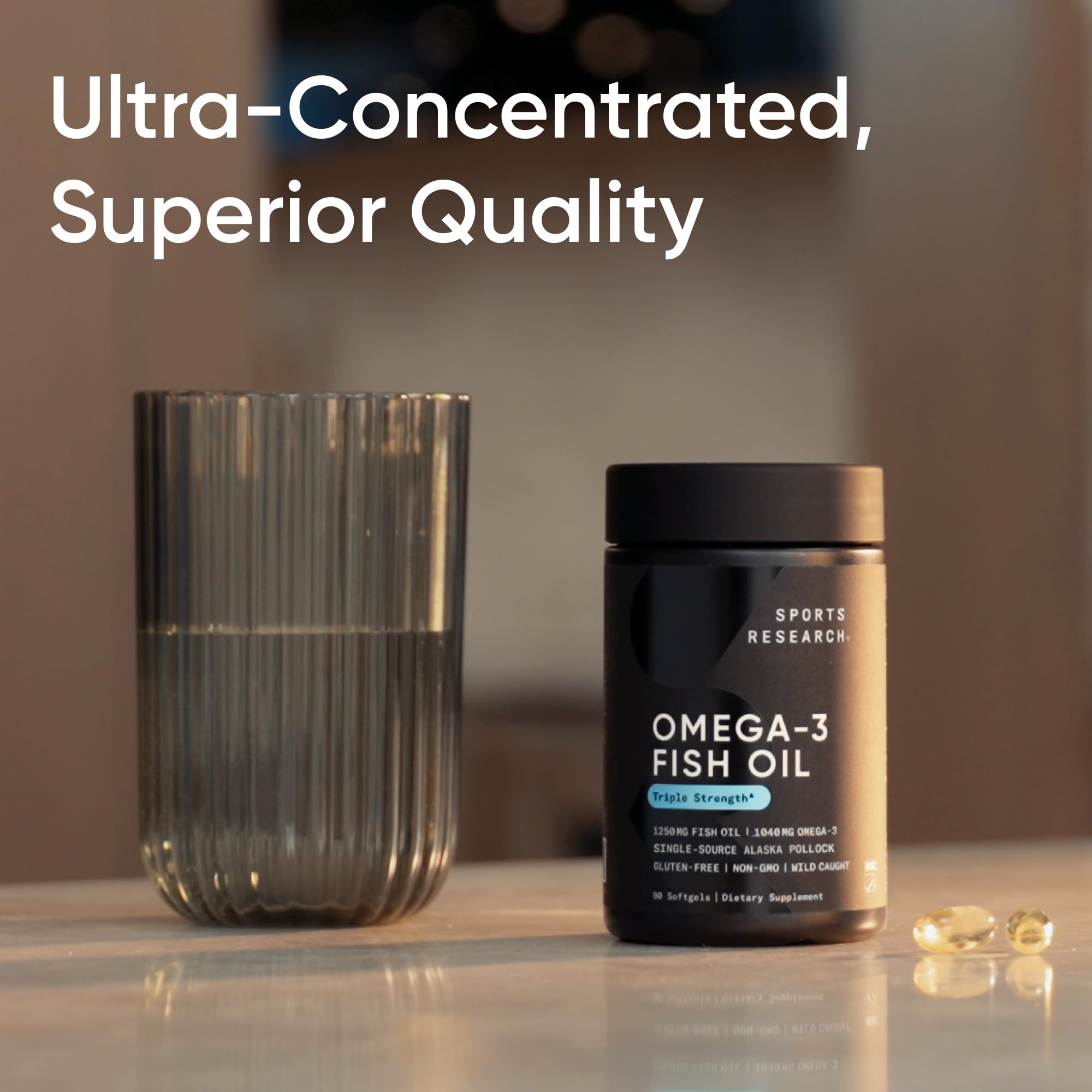 Sports Research softgel in hand for scale to show compact size and easy swallowing benefit