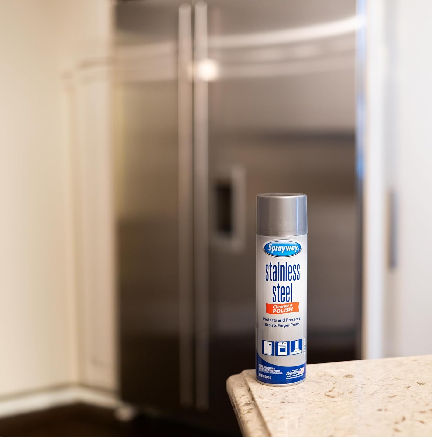 Kitchen scene with Sprayway used on hood and fridge, illustrates professional shine and protection