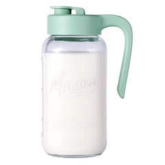 Spreccio pitcher front view showing glass body and secure lid, clean serving benefit