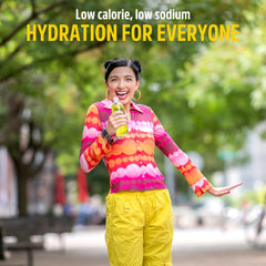 Clear bottle with mixed Sqwincher lemonade showing color and clarity, refreshing hydration