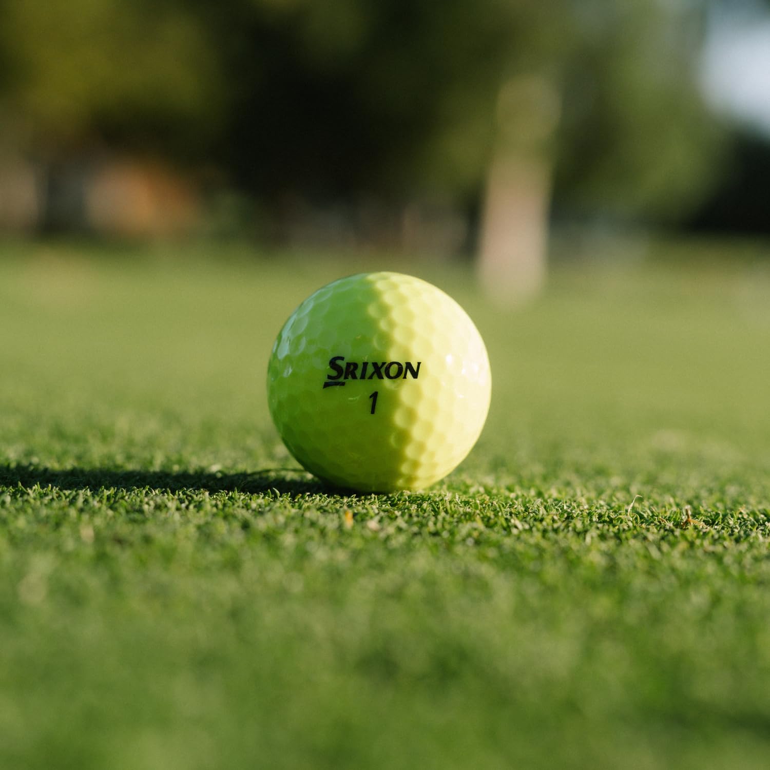 Srixon Soft Feel ball flying over fairway illustrating distance and visible flight tracking
