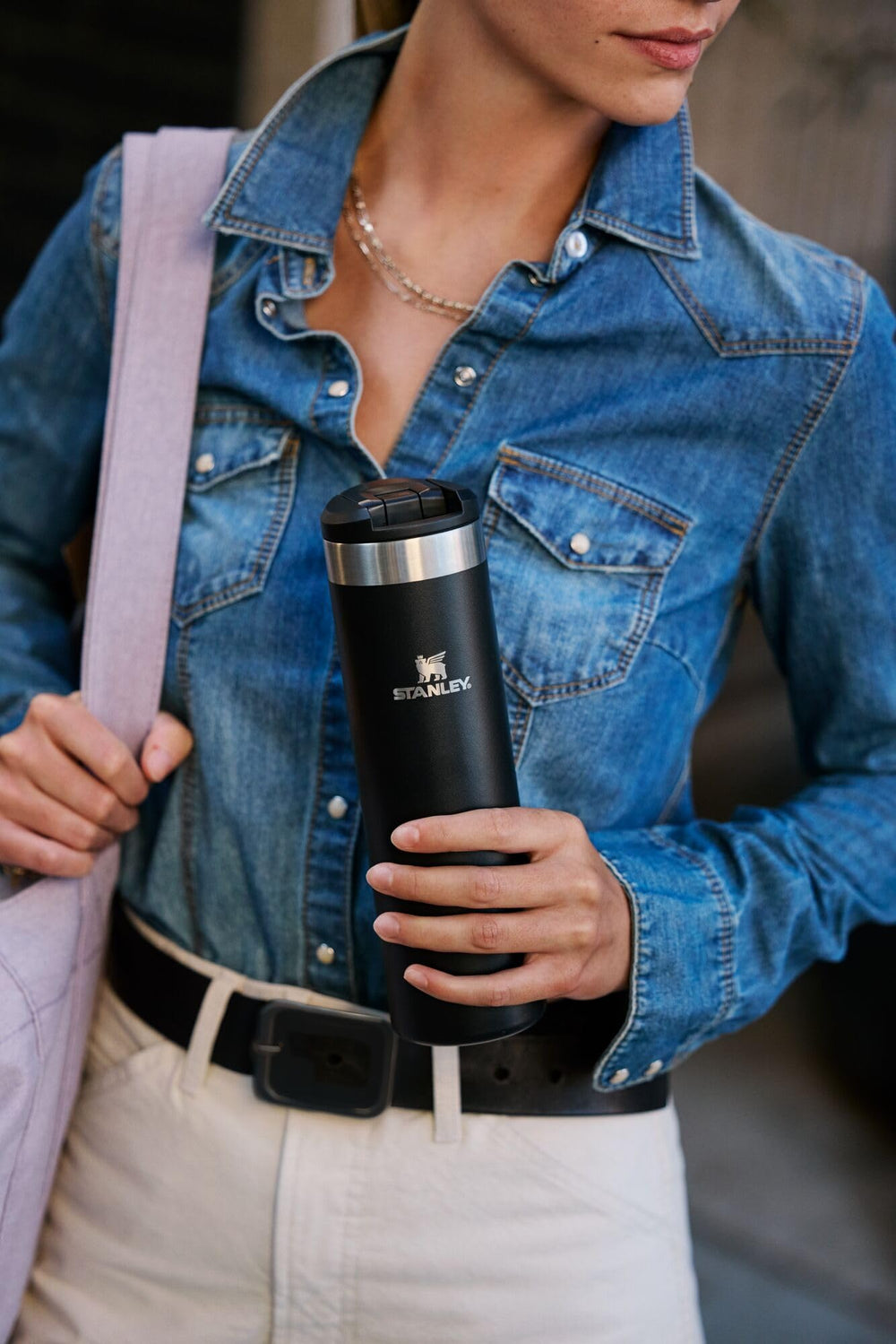 STANLEY mug seated in car cupholder demonstrating convenient travel stability