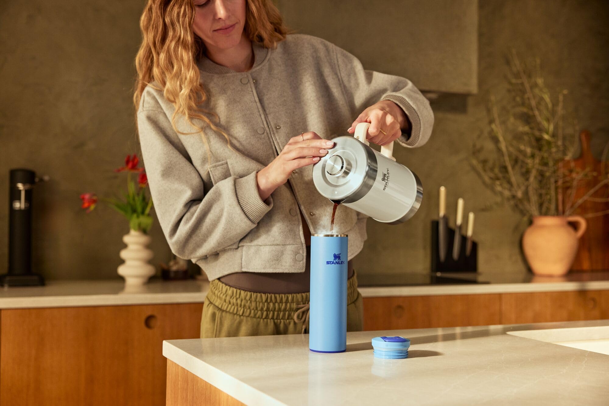 STANLEY mug in commuter setting showing lightweight portability for daily use
