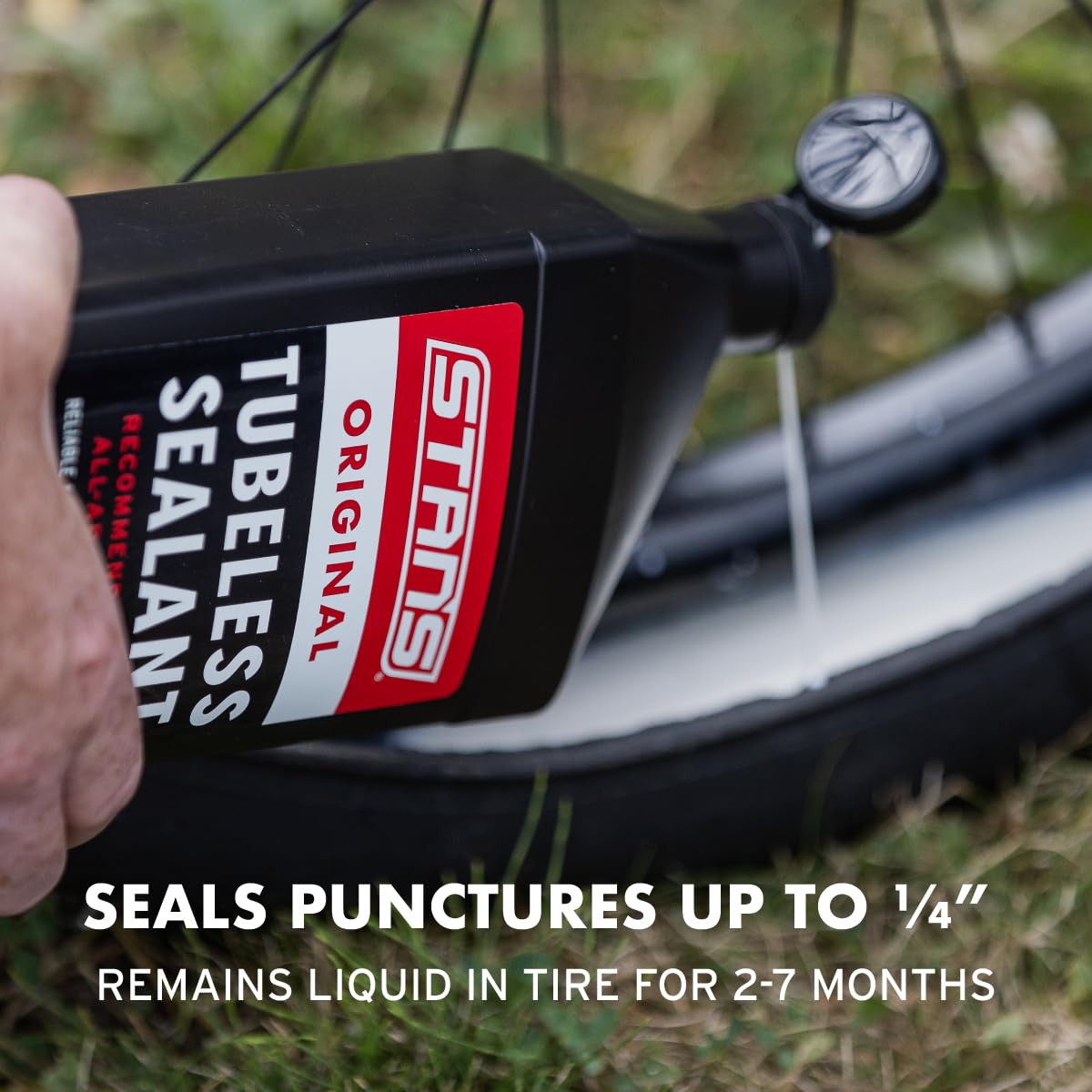 Stan's NoTubes being poured into tire with clean application and fast refill benefit