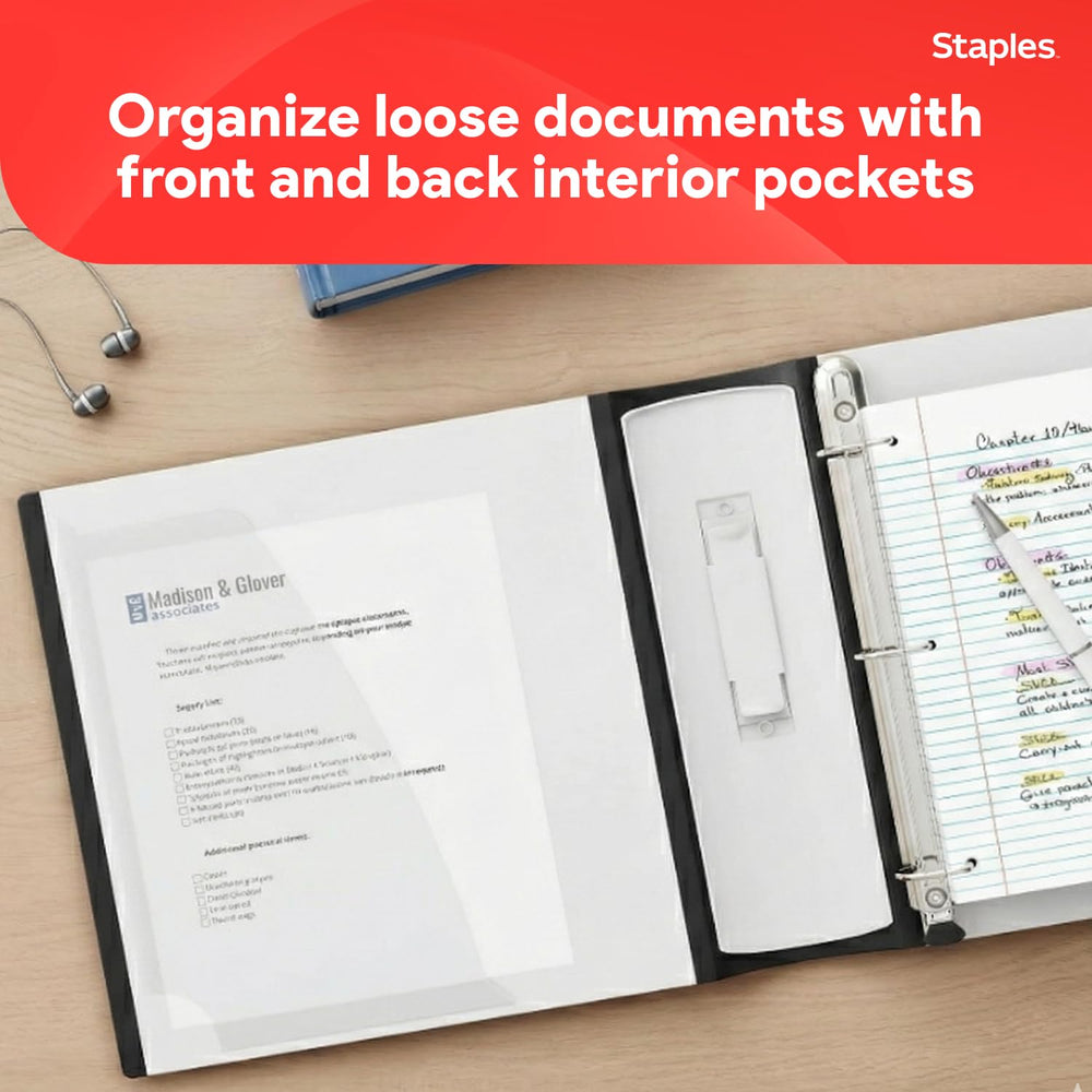 STAPLES Better Binder stacked with paper to illustrate 540-sheet holding capacity