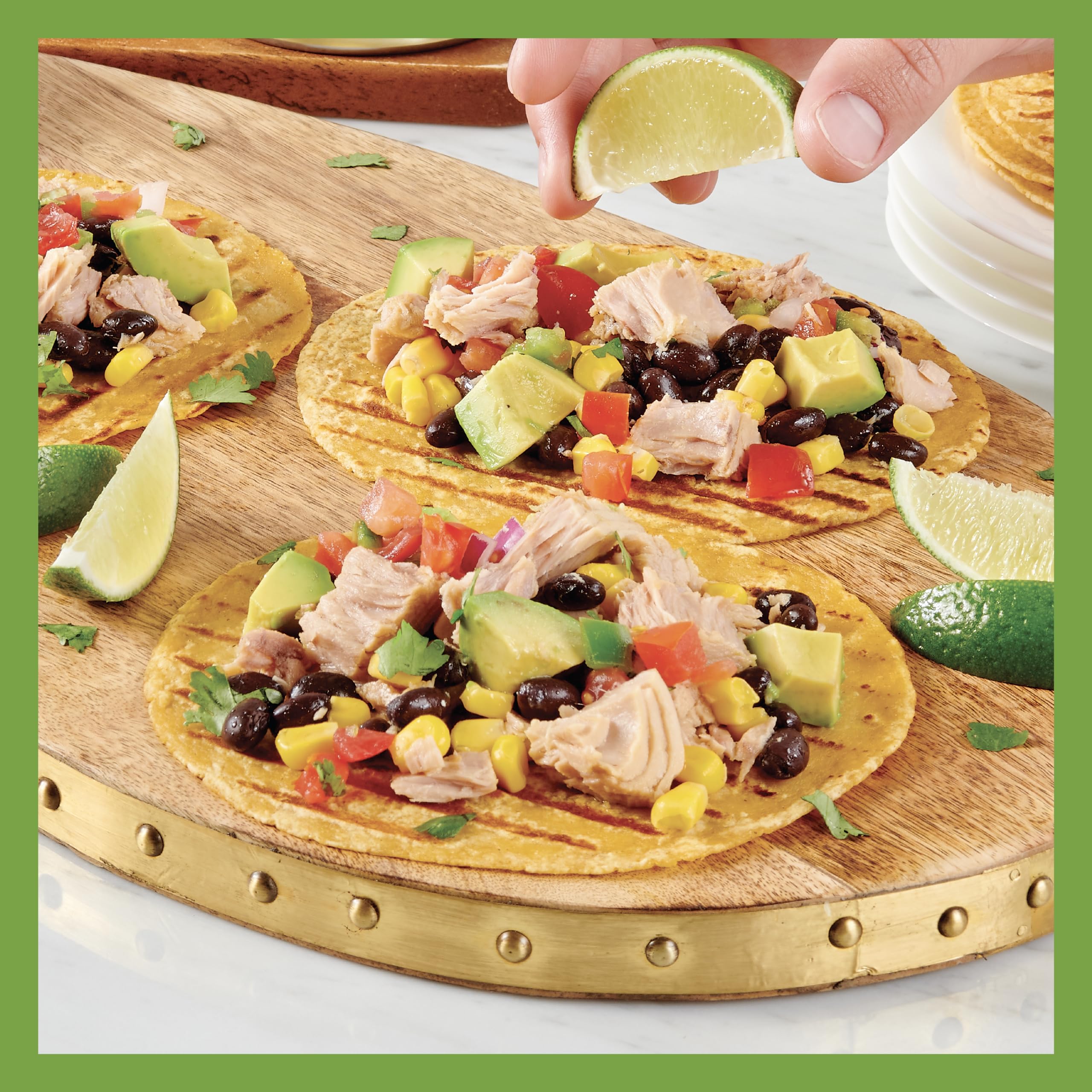 StarKist E.V.O.O. tuna served on crackers showing easy snack idea on the go